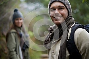 Nature portrait, happy man or couple on hiking journey, travel adventure or mountain climbing walk. Woods, love or face