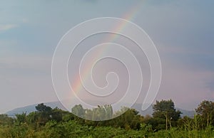 Nature rainbow over land field