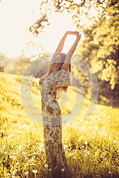 Nature is relaxing. Woman at spring season.