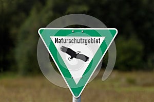 Nature reserve sign in germany text translation `nature reserve`