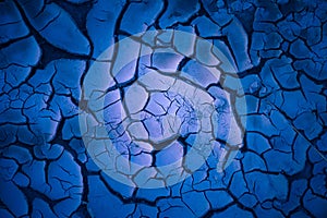 Nature\'s Abstract Canvas: Blue Cracked Mud Artistry