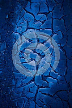 Nature\'s Abstract Canvas: Blue Cracked Mud Artistry