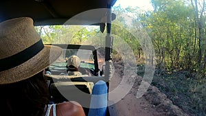 Nature, safari and people driving in a cart on a summer vacation, holiday or weekend trip. Explore, travel and tour