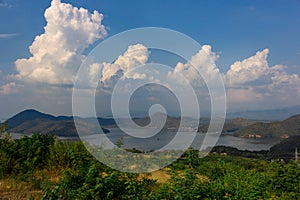 Nature scene of Srinagarind Dam with cloudy sky at kanchanaburi ,Thailand