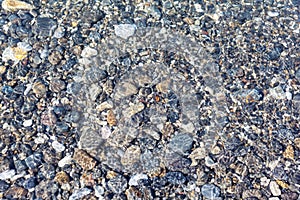 Nature set: sea pebbles under water background