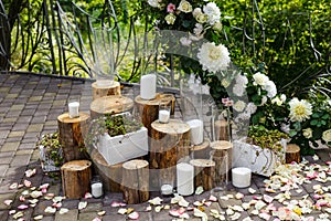 Nature theme in wedding ceremony decoration. Newlyweds arch decorated in rustic style