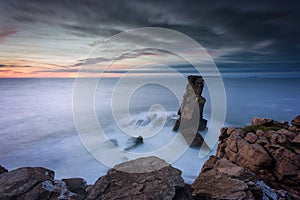 Nau dos Corvos rock in Peniche, Portugal, at blue hour