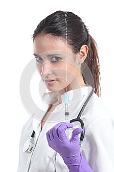 Naughty beautiful nurse playing with a syringe