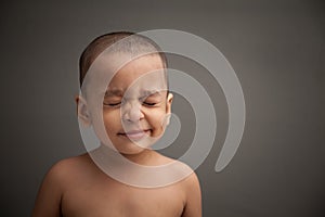 Naughty indian baby amaze and smile photo