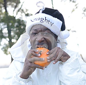 Naughty Santa Eating A Pumpkin