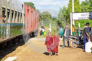 NAUNG HUIO, MYANMAR - November 16, 2015:young monks leaving the trai