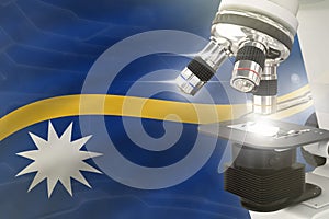 Nauru science development concept - microscope on flag background. Research in genetics or cell life 3D illustration of object
