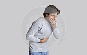 Nausea and stomach pain concept, free space photo