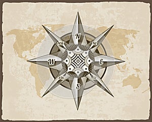 Nautical antique compass sign on old paper texture world map with torn border frame. Element for marine theme and