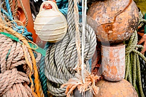 Nautical background. Closeup of old colorful mooring ropes , Old