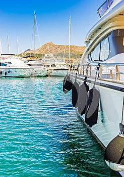 Nautical background with luxury boats yachts at marina