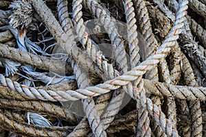 Nautical background of old frayed boat rope