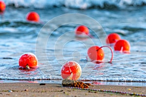 Nautical buoys in sea water close up