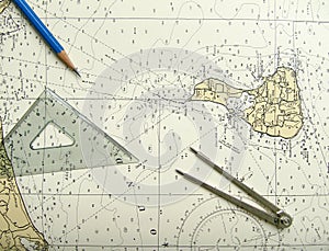 Nautical chart and divider photo