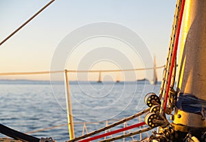 Nautical close-up rigging and pulleys at base of mast