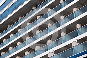 Nautical Elegance: A Close-up of Cruise Ship Cabins and Balconies from a Low-Angle Perspective