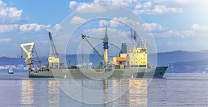 Nautical fishing coracles on sea in port Vladivostok