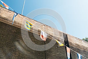 Nautical flags on the ship in the lock