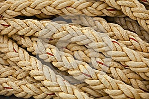 Nautical knots. Big marine vintage sea ropes in heap background