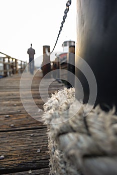 Nautical Rope and Man on Dock