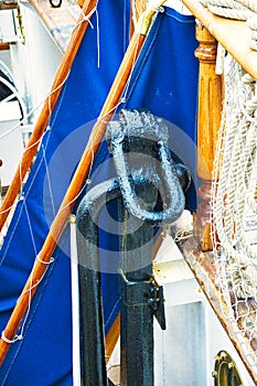 Nautical tackles and equipment of the old tall ship. Rigging ropes and rope ladder on the mast of sailing vessel