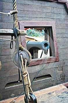 Nautical tackles and equipment of the old tall ship. Rigging ropes and rope ladder on the mast of sailing vessel