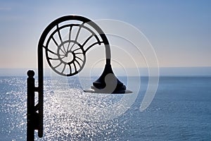 Nautilus Lamp Against A Soft Blue Ocean