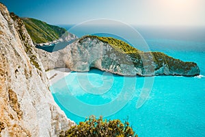 Navagio beach or Shipwreck bay panoramic. Turquoise sea water and white beach between huge cliffs. Famous landmark