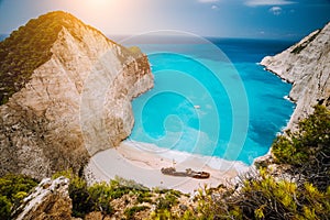 Navagio beach or Shipwreck bay with turquoise water and pebble white beach. Famous landmark location. overhead landscape photo