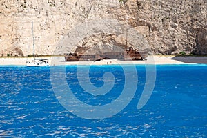 Navagio Beach in summer time with blue water of Greece , Zakintos