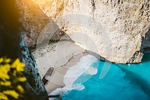 Navagio beach Zakynthos with shipwreck in the warm morning light. Greece