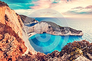 Navagio shipwreck beach in Zakynthos Greece at sunset