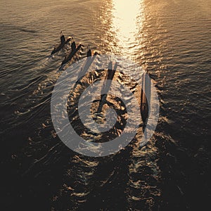 Naval submarines on the surface of the ocean. Nuclear-powered submarines