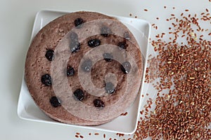 Navara rice vattayappam. Steamed rice cake made with a fermented batter of navara rice and coconut and steamed in a round dish