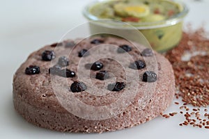 Navara rice vattayappam. Steamed rice cake made with a fermented batter of navara rice and coconut and steamed in a round dish