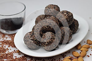 Navara til laddu. Sweet ball made of roasted and ground navara rice, roasted sesame seeds, jaggery and grated coconut flavored