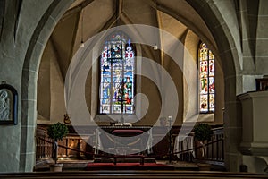 Nave with altar and stained glass photo