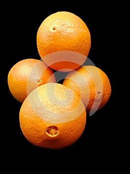 Navels of fresh oranges