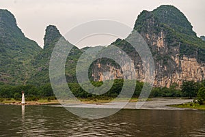 Navigation Beacon with karst mountains and cliff along the Li River in Guilin, China