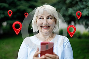 Navigation and digital map concepts with woman using gps on smartphone