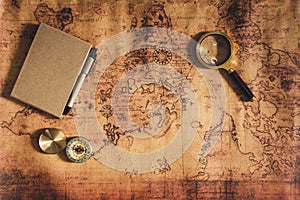 Navigation explore journey planning with compass magnifying glass and notebook layout on world map background., Expeditions