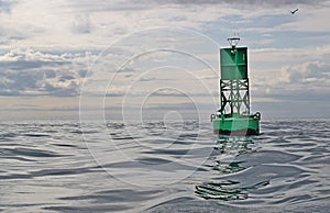 Navigational buoy in calm seas with clouds