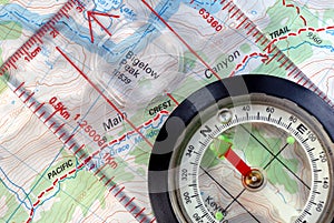 Navigational Compass on Topographical Map photo