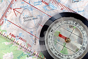 Navigational Compass on Topographical Map photo