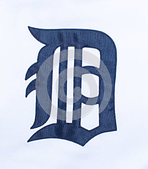A navy blue letter D in Collins Old English Regular font. Fabric stitched Detroit tigers American professional major league